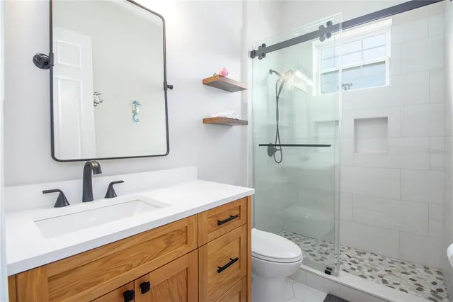 a view of a kitchen with washer and dryer