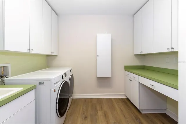 a bathroom with a sink toilet a mirror and shower