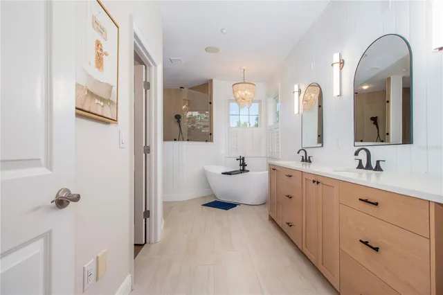 a balcony with furniture and a potted plant