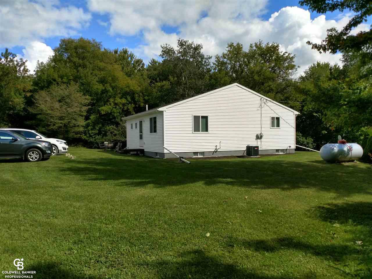 12168 Fisher Road Yale, MI 48097 - Photo 19 of 23 This is a side view of the home.