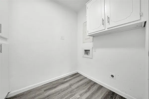 a view of small space with wooden floor