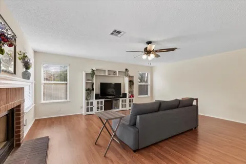 a kitchen with stainless steel appliances granite countertop a sink a stove and a microwave