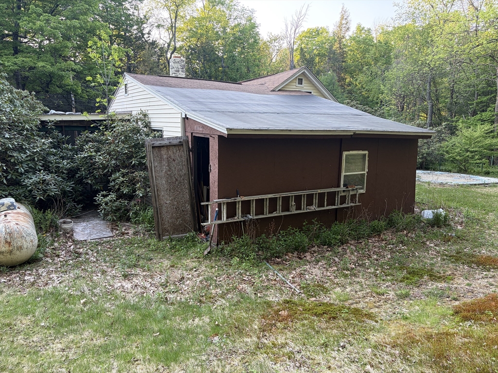 11 South Chesterfield Road Goshen, MA 01096 - Photo 29 of 30 a backyard of a house with lots of green space