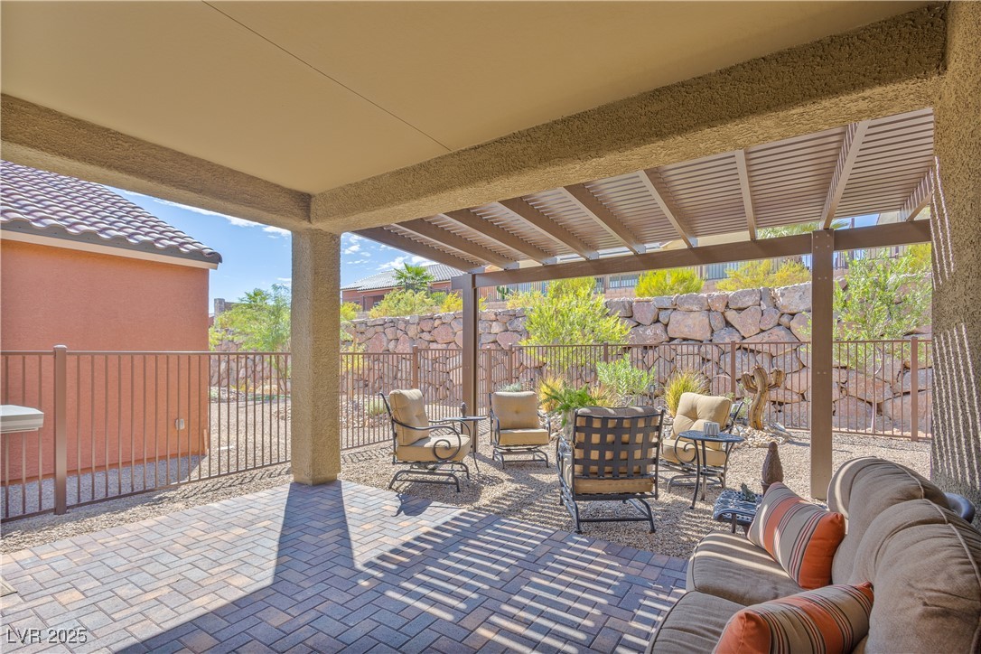 1129 Calico Ridge Mesquite, NV 89034 - Photo 11 of 22 Fenced patio, pergola off dining area