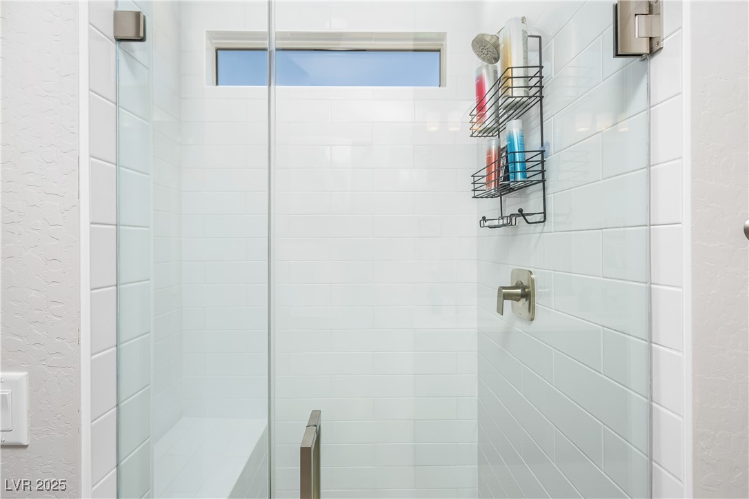 1129 Calico Ridge Mesquite, NV 89034 - Photo 16 of 22 Upgraded tile & glass master shower