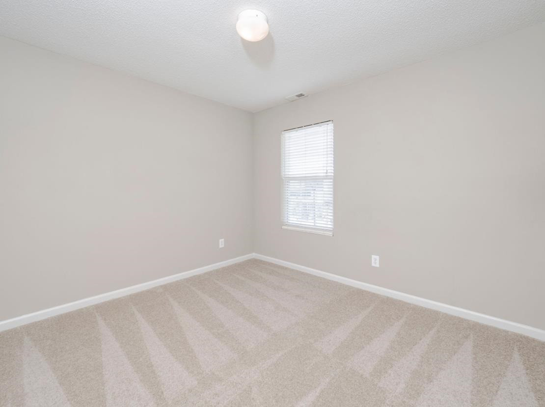 4715 Cardinal Grove Boulevard Raleigh, NC 27616 - Photo 13 of 17 Photo 13