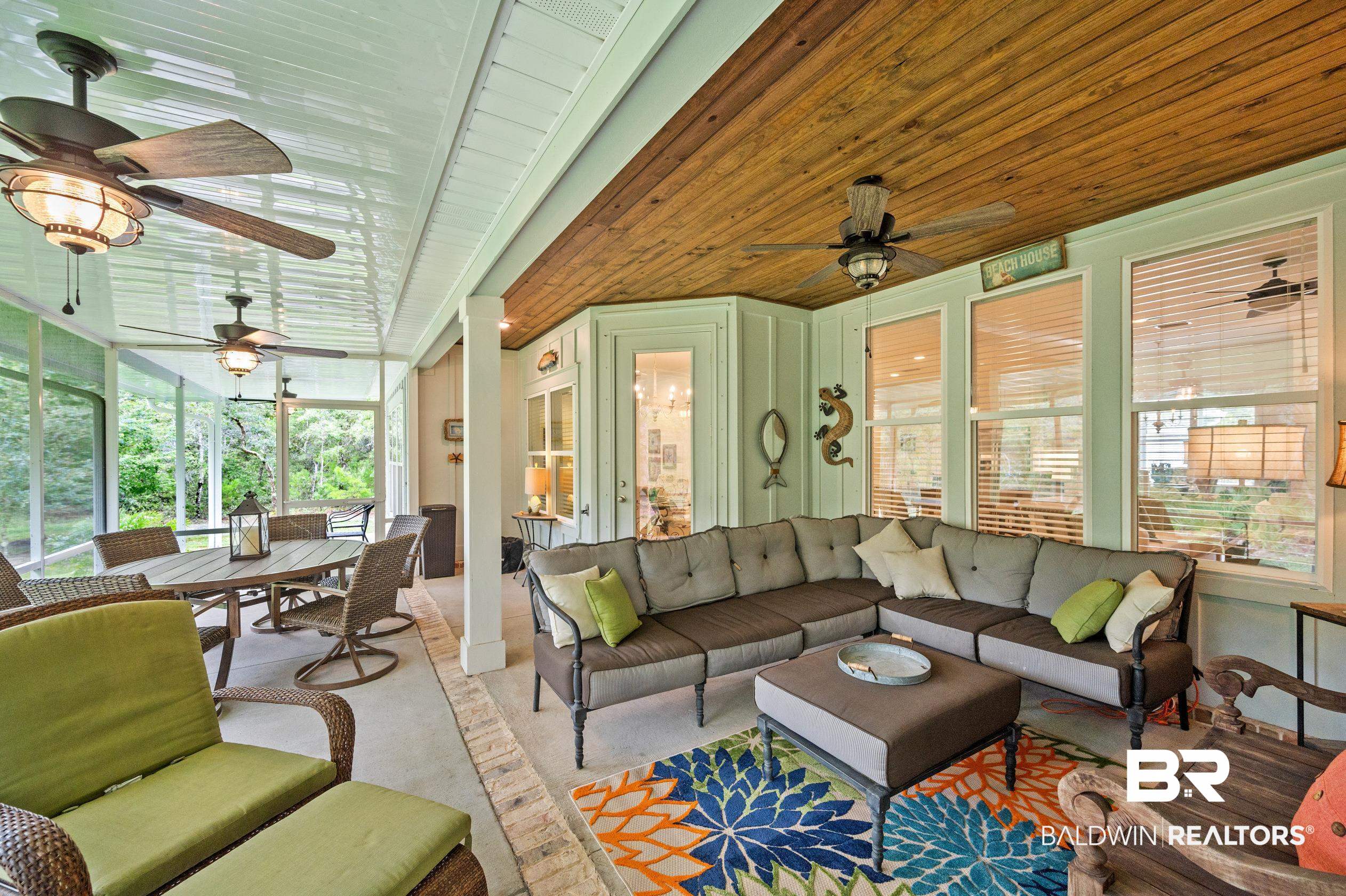 4601 Surrey Lane Orange Beach, AL 36561 - Photo 36 of 43 Sunroom with ceiling fan and wood ceiling