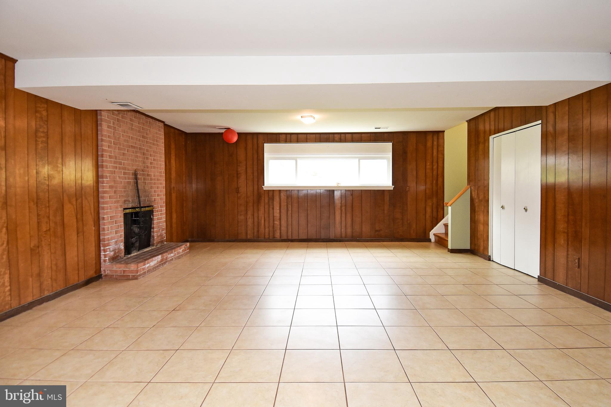 1043 Warbler Place McLean, VA 22101 - Photo 13 of 17 Wood Burning Fireplace in LL Rec. Room