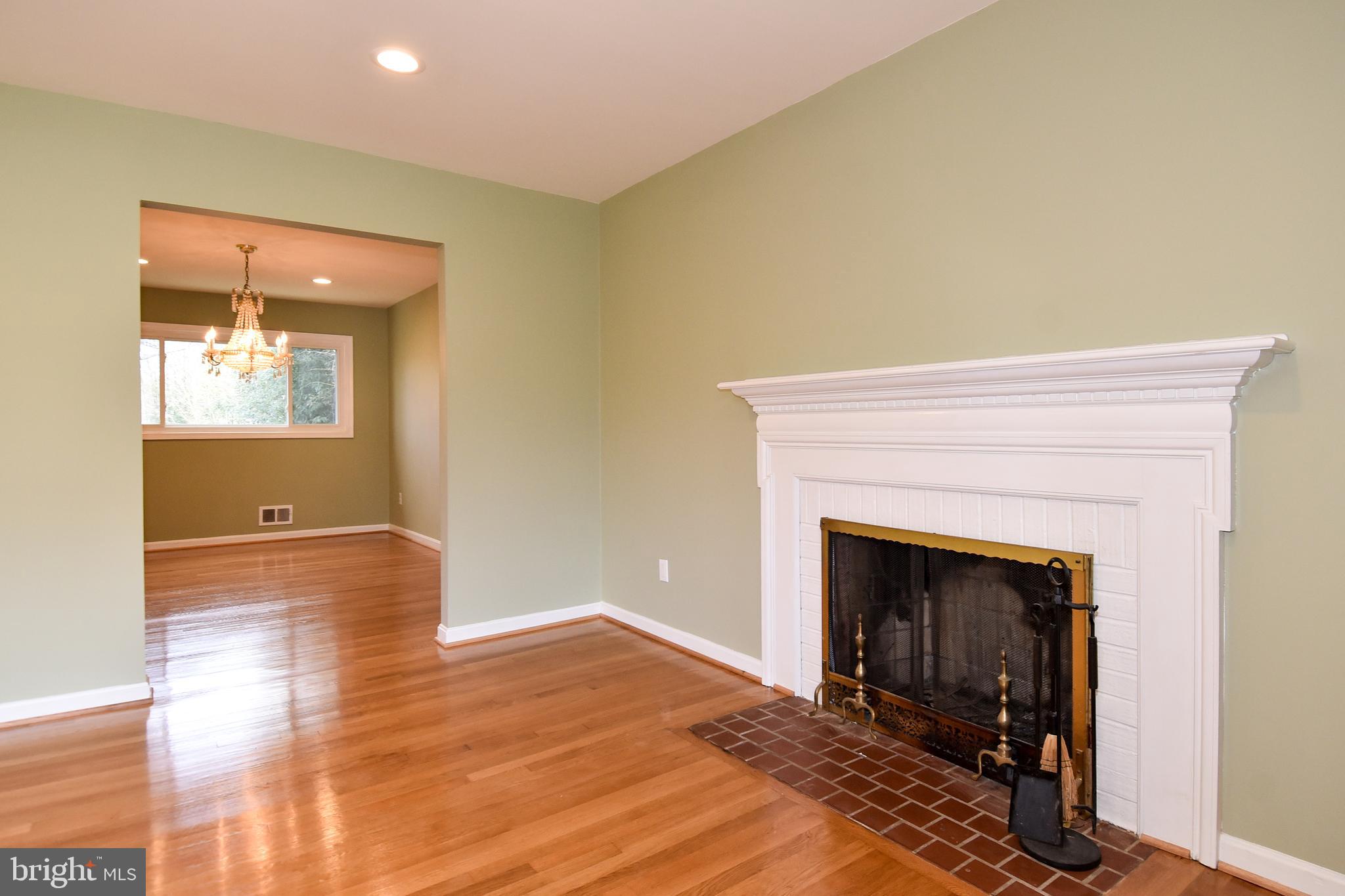 1043 Warbler Place McLean, VA 22101 - Photo 3 of 17 Wood Burning Fireplace in Living Room