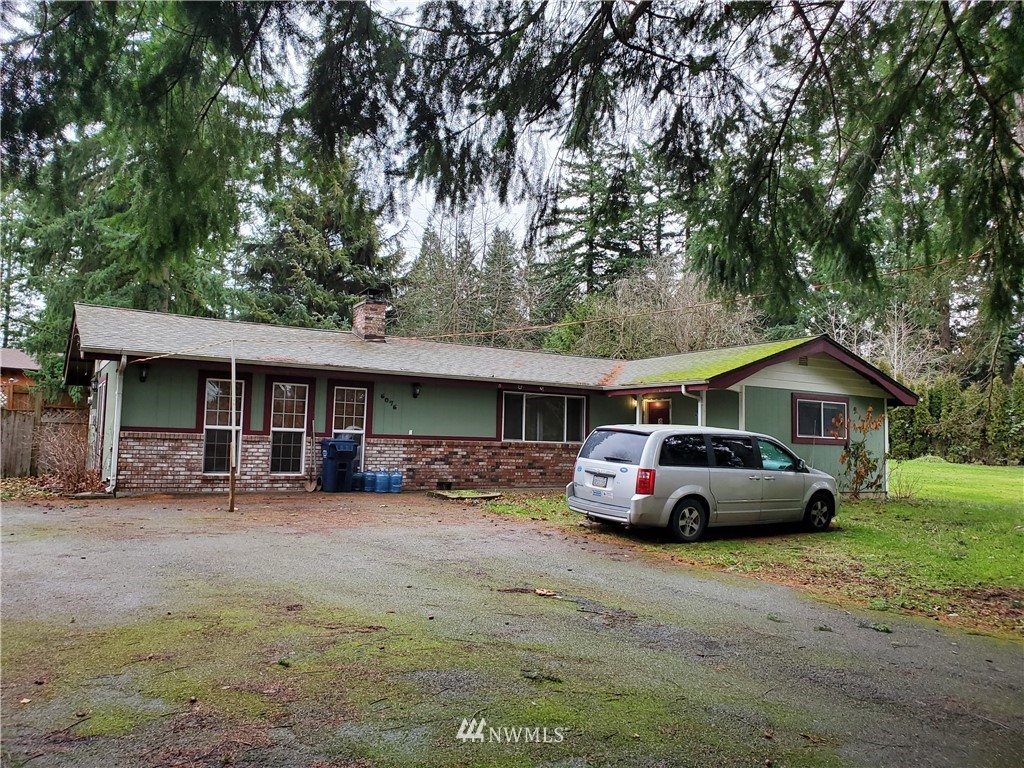 6076 Fazon Road Bellingham, WA 98226 - Photo 1 of 19 a car parked in front of a house