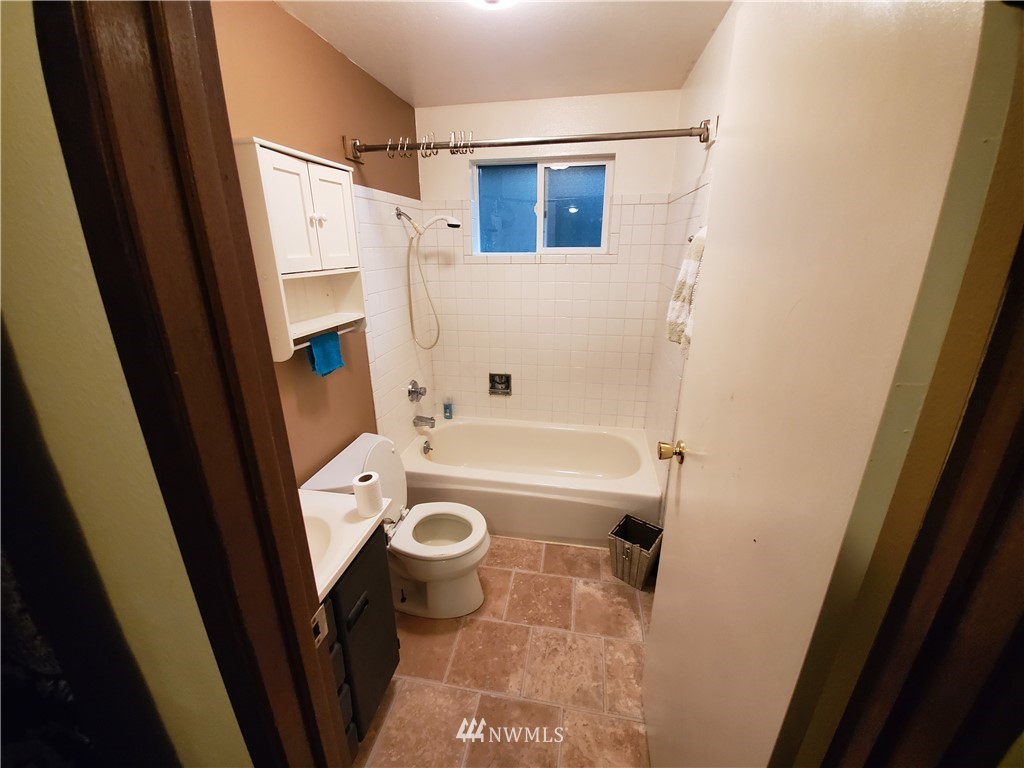 6076 Fazon Road Bellingham, WA 98226 - Photo 13 of 19 a bathroom with a granite countertop sink toilet and shower