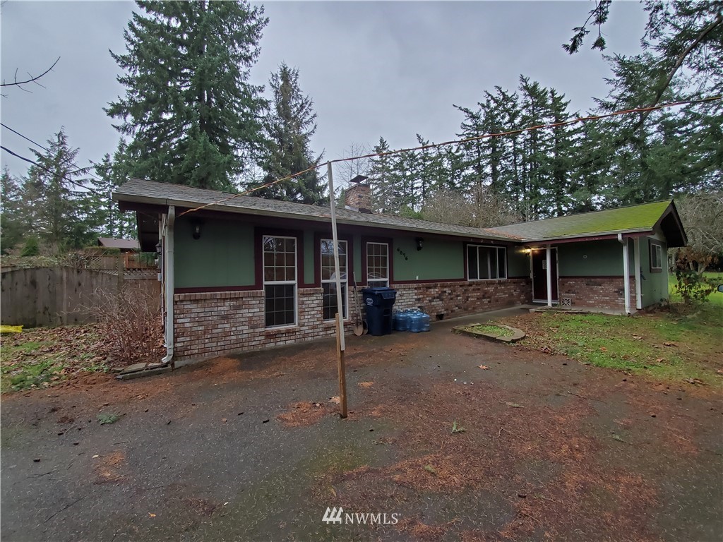 6076 Fazon Road Bellingham, WA 98226 - Photo 19 of 19 a view of a house with a yard and large tree