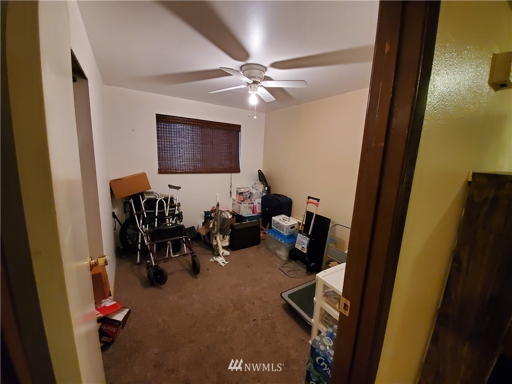 6076 Fazon Road Bellingham, WA 98226 - Photo 10 of 19 a view of a workspace with furniture and a window