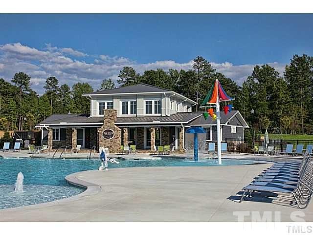 925 Wildflower Ridge Road Wake Forest, NC 27587 - Photo 21 of 24 a front view of a house with a yard