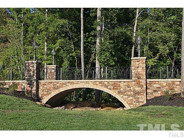925 Wildflower Ridge Road Wake Forest, NC 27587 - Photo 24 of 24 a view of a wooden fence