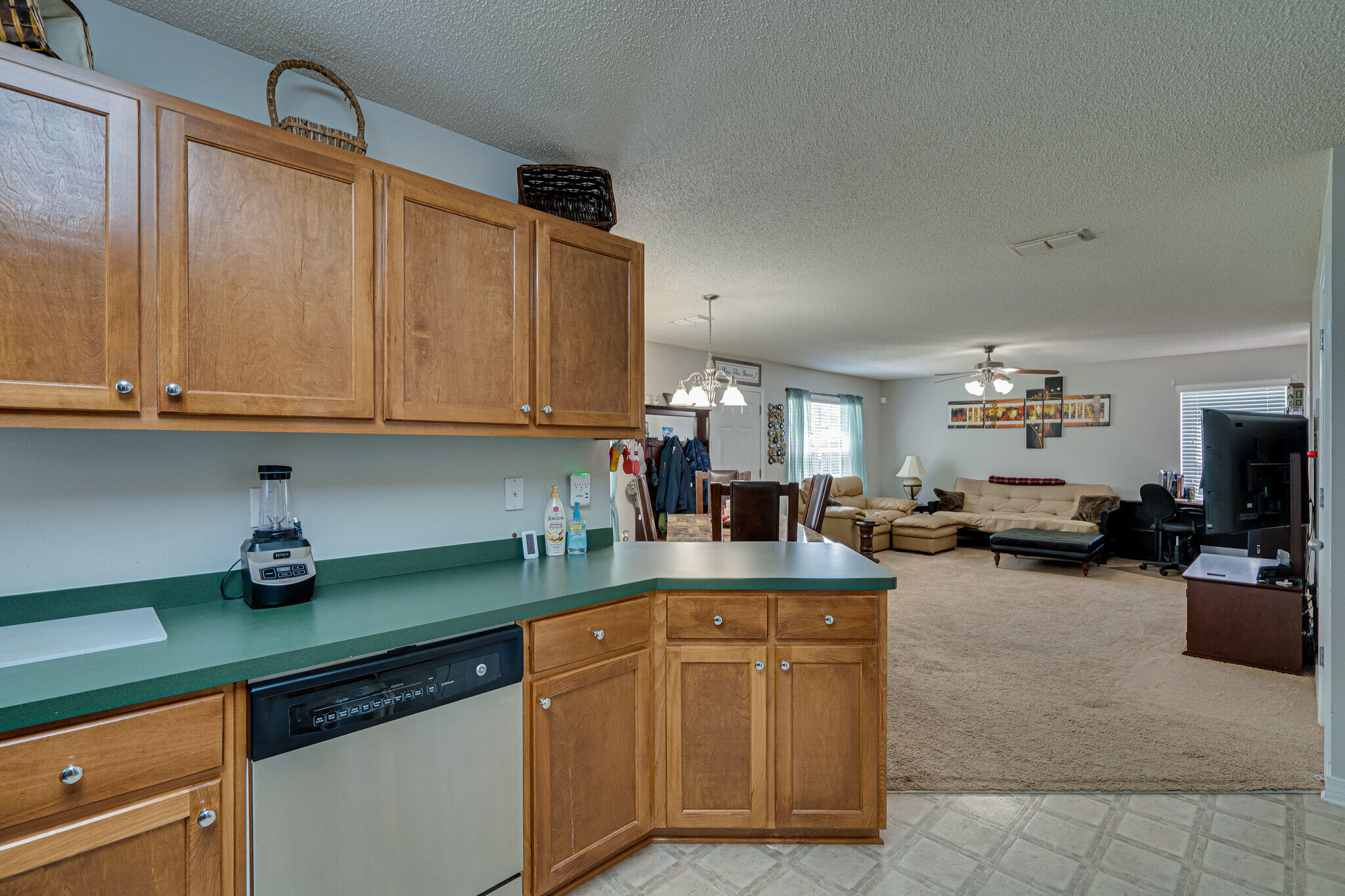412 Plate Drive Crestview, FL 32539 - Photo 13 of 29 a kitchen with counter top space cabinets and a sink