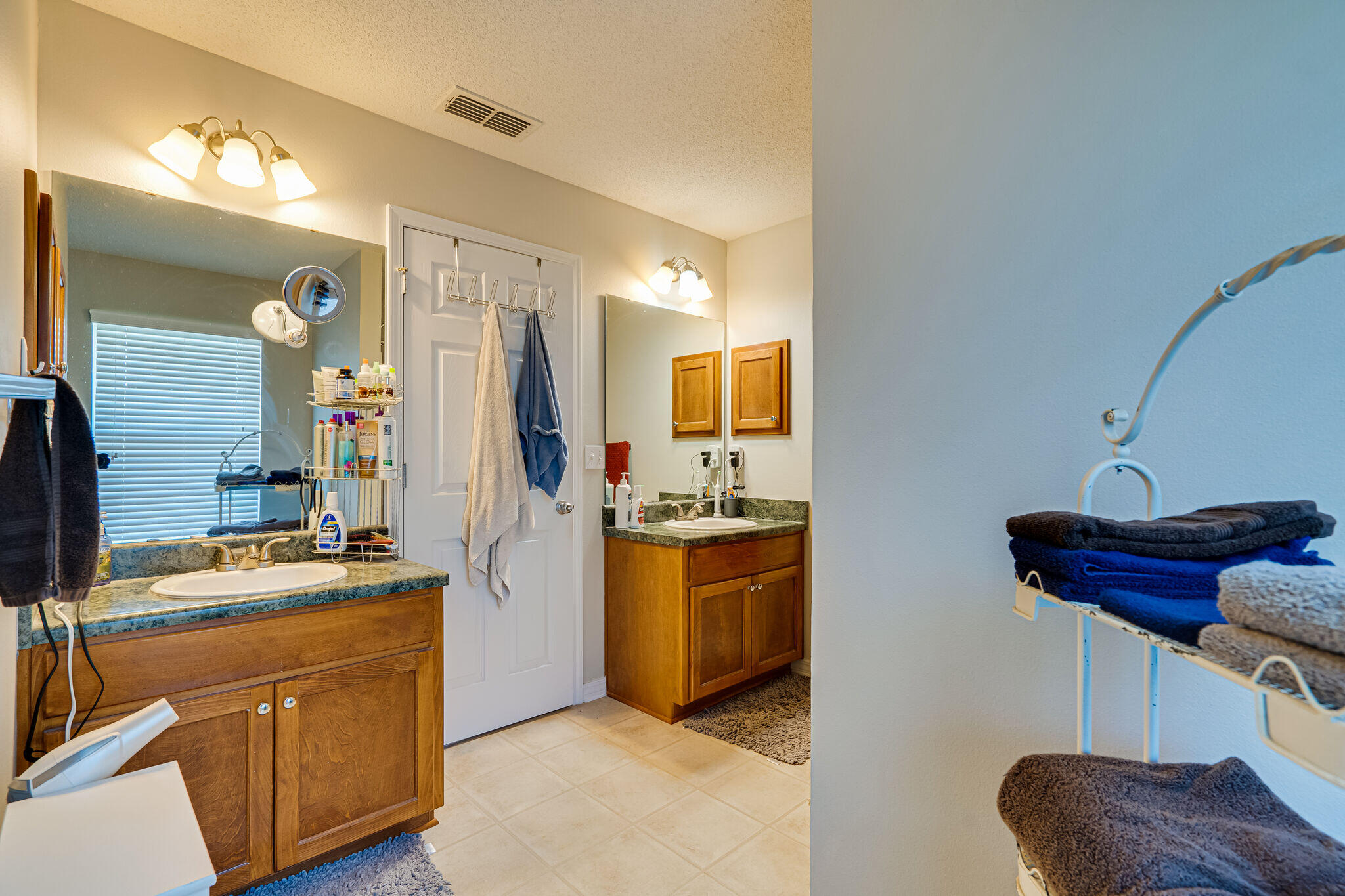 412 Plate Drive Crestview, FL 32539 - Photo 19 of 29 a kitchen with a sink stove and refrigerator
