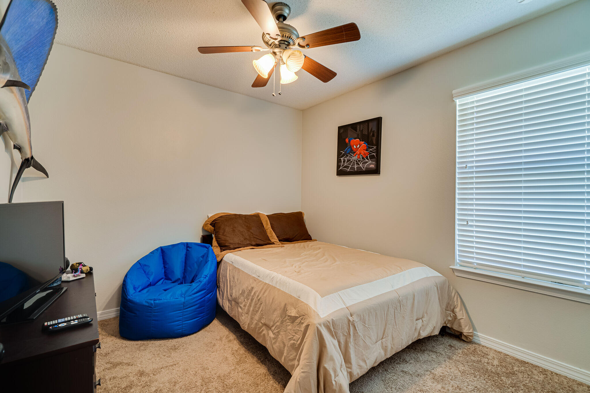 412 Plate Drive Crestview, FL 32539 - Photo 22 of 29 a bedroom with a bed and a chandelier