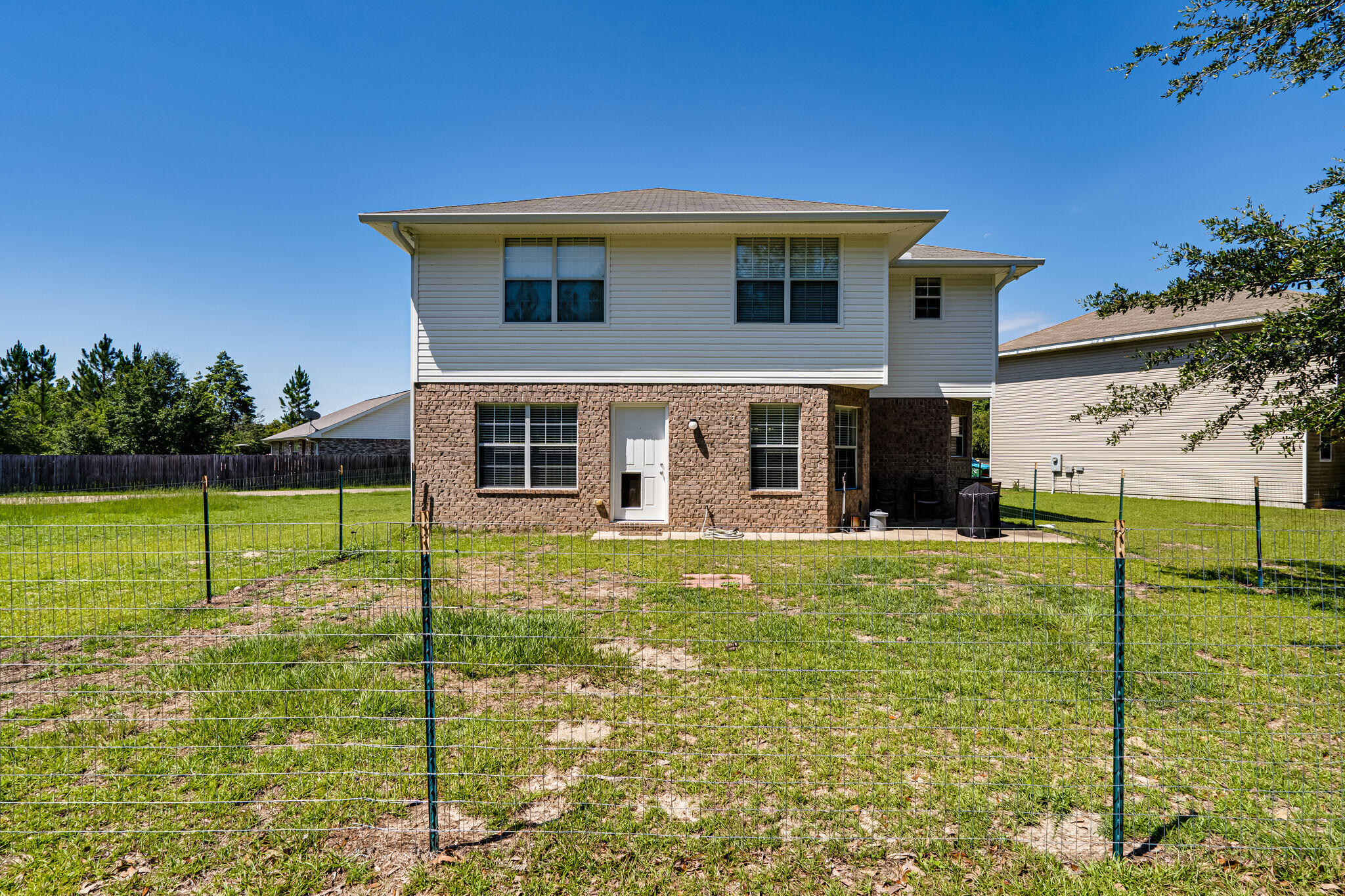 412 Plate Drive Crestview, FL 32539 - Photo 29 of 29 a view of a house with a yard
