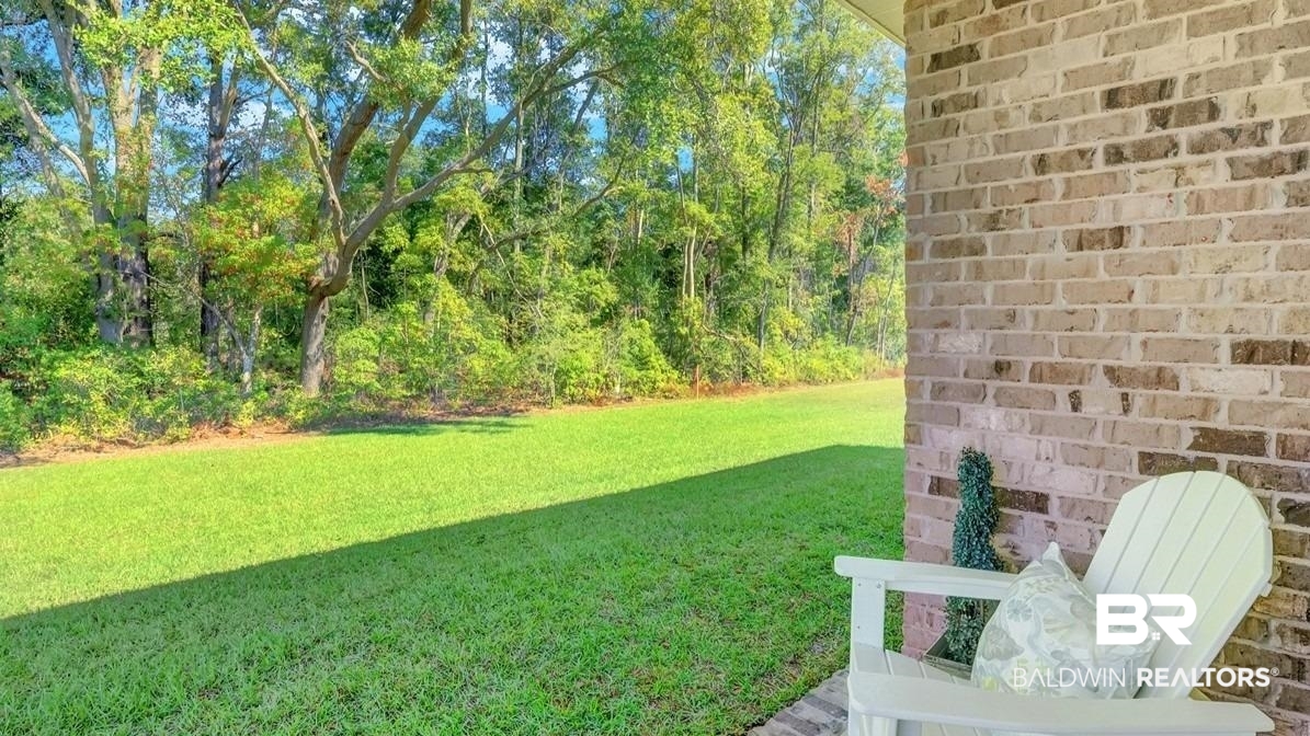 293 Hudson Loop Fairhope, AL 36532 - Photo 29 of 30 View of green lawn