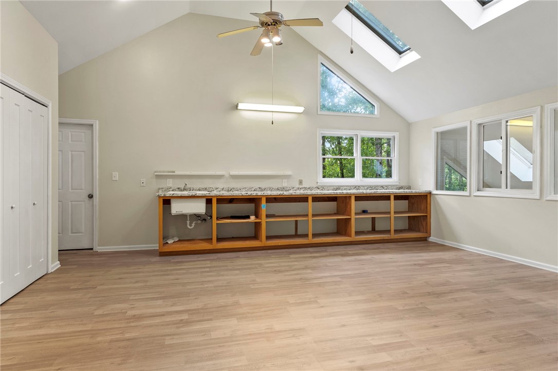 225 Arrowhead Trail Easley, SC 29642 - Photo 28 of 33 This spacious interior offers an abundance of natural light and vaulted ceilings, perfect for creative pursuits.