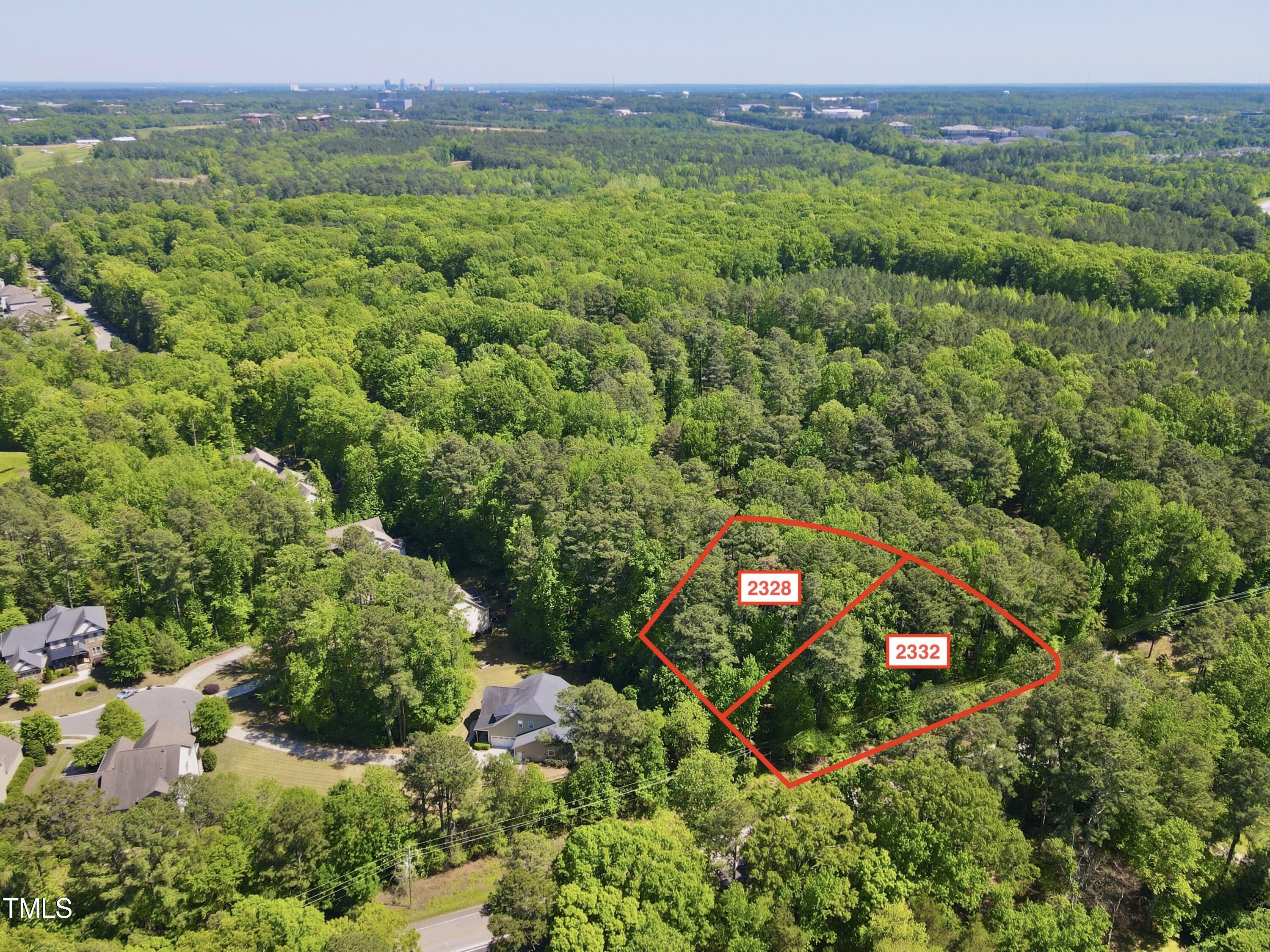 2328 Windy Woods Drive Raleigh, NC 27607 - Photo 4 of 4 dji_fly_20240423_144250_63_1713898041006