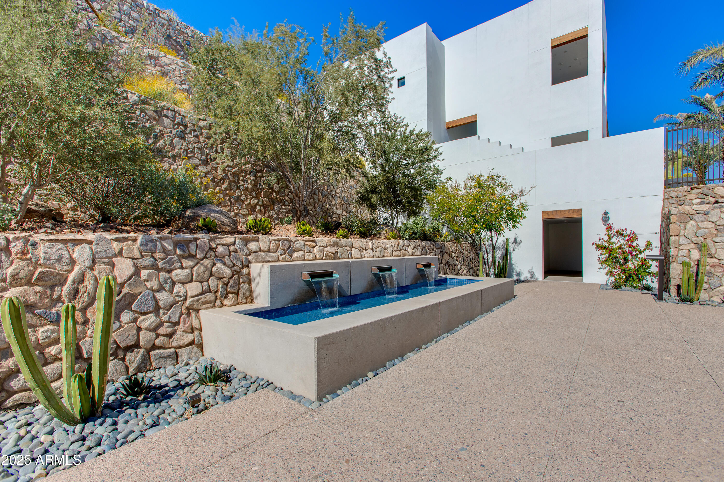 5000 North Camelback Ridge Drive, Unit 206 Scottsdale, AZ 85251 - Photo 42 of 62 a view of a house with outdoor space