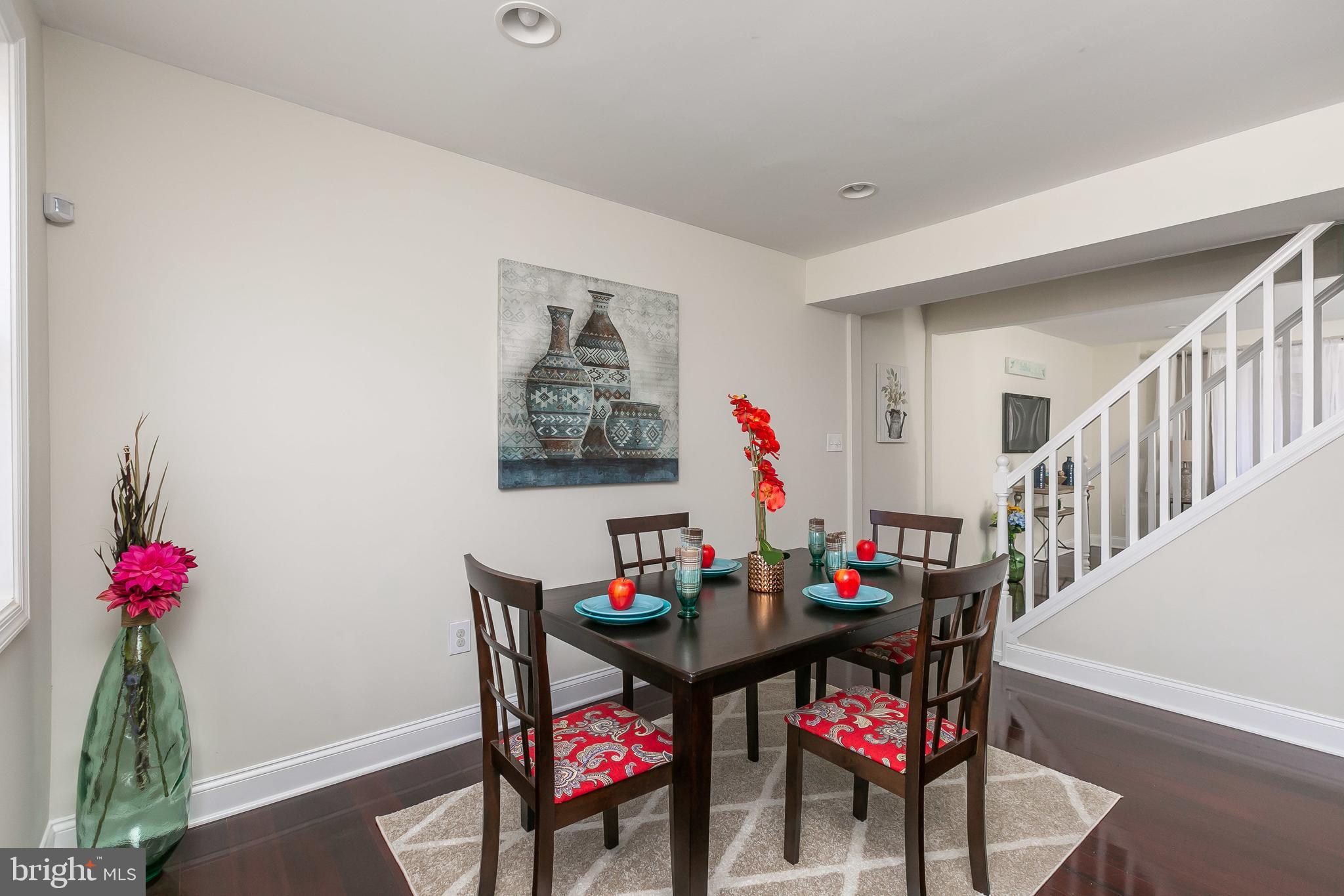 3202 Dorithan Road Baltimore, MD 21215 - Photo 15 of 36 Sight line into Living Room and Wide Staircase