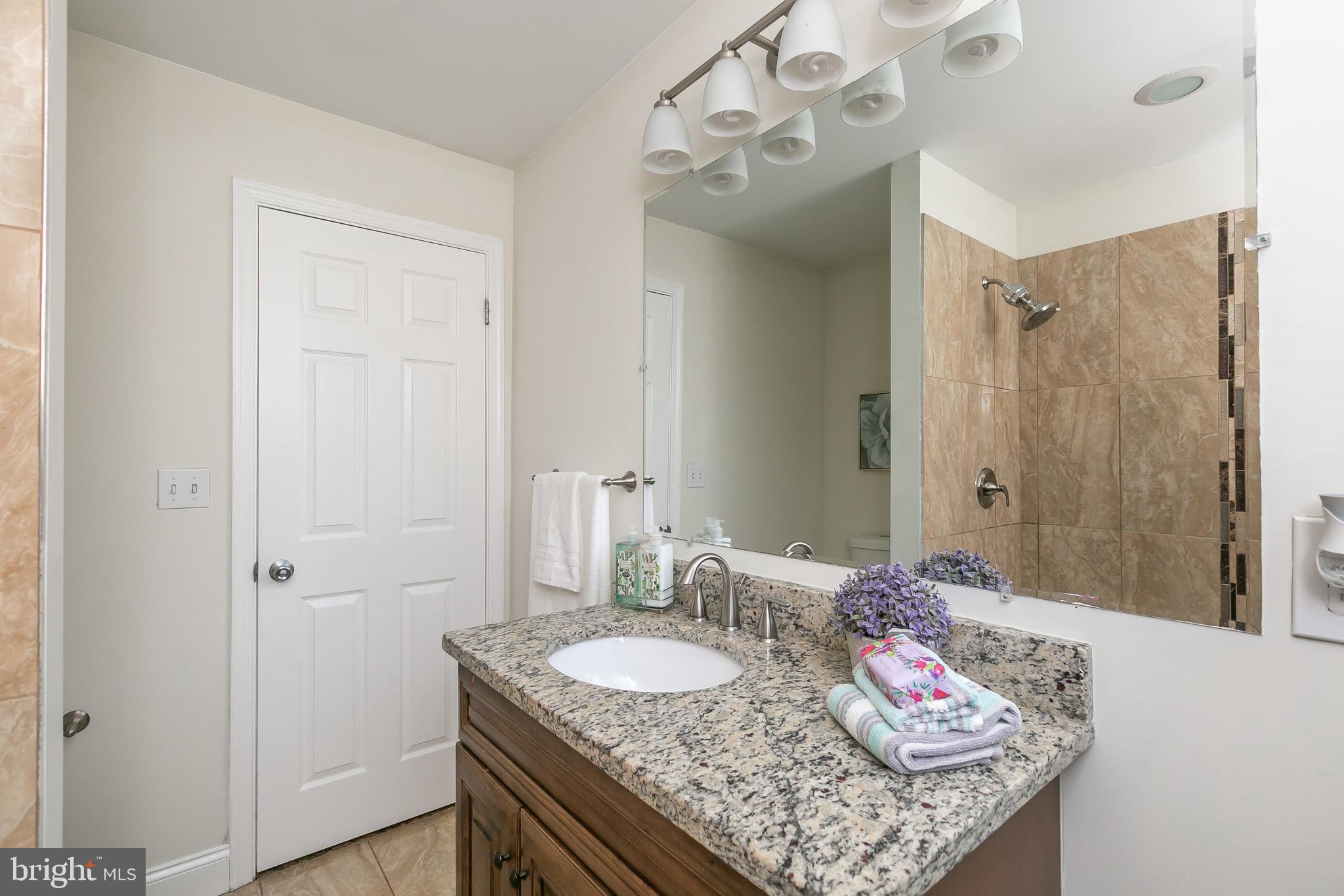3202 Dorithan Road Baltimore, MD 21215 - Photo 17 of 36 Upper Level Bathroom with Modern Touches!