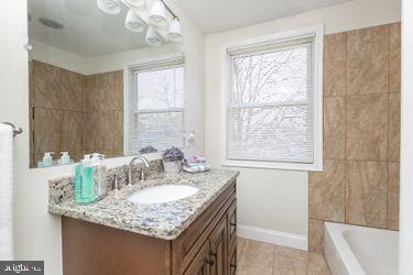 3202 Dorithan Road Baltimore, MD 21215 - Photo 18 of 36 Gleaming Tile Floors, Stone Basin Top, etc...