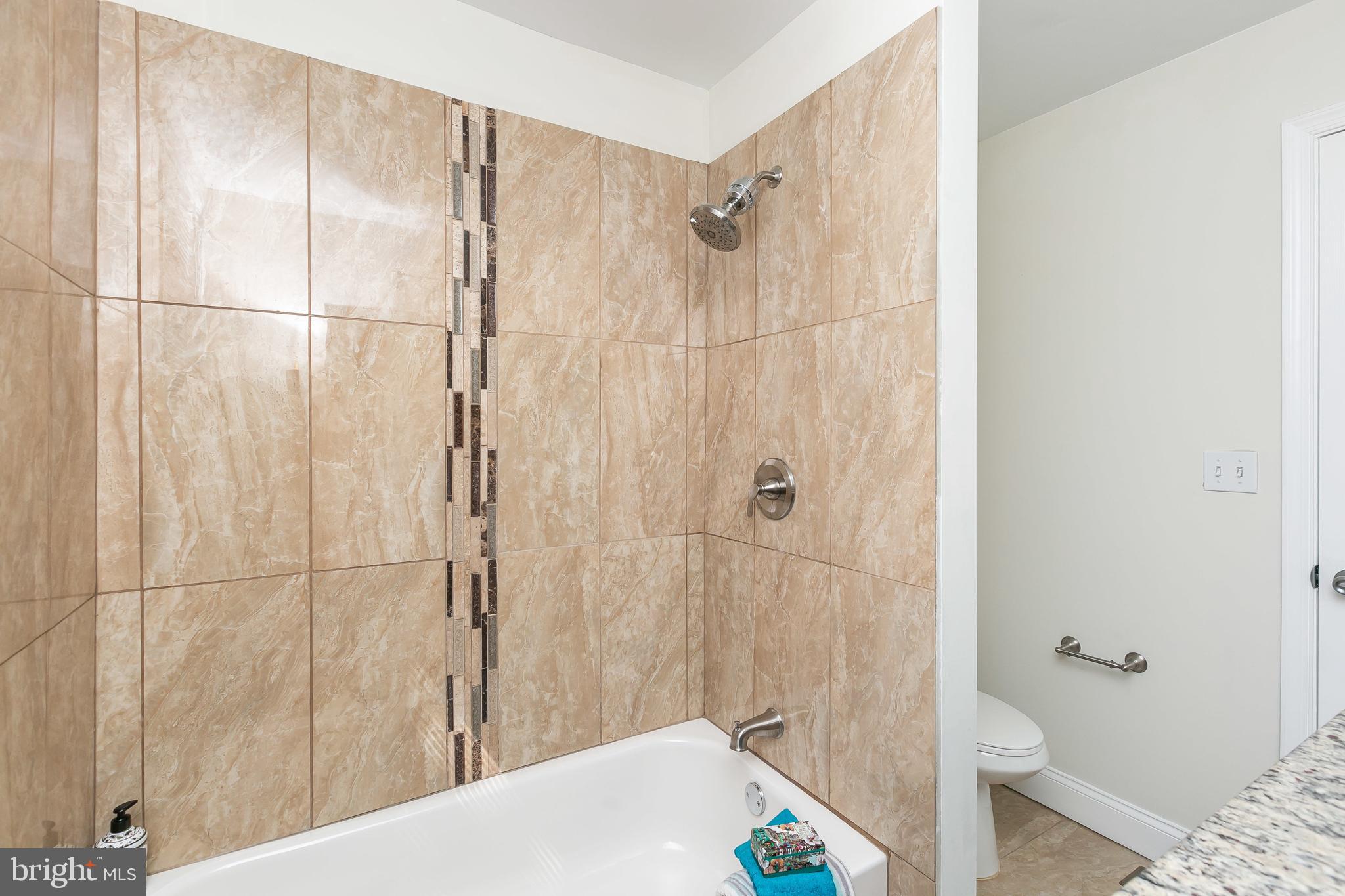 3202 Dorithan Road Baltimore, MD 21215 - Photo 19 of 36 Ceramic and Mosaic Tilework in Tub & Shower Combo