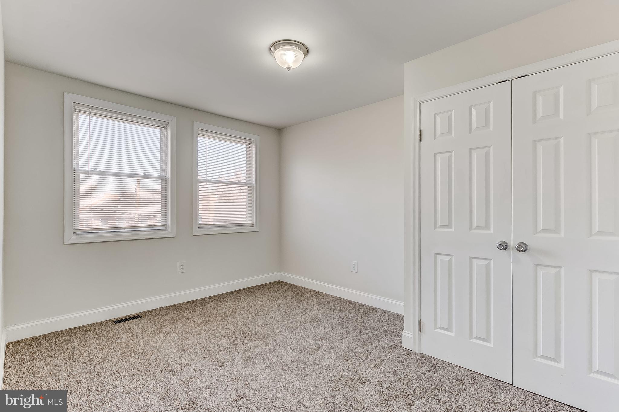 3202 Dorithan Road Baltimore, MD 21215 - Photo 24 of 36 Plenty of Light and Wall to Wall Carpet