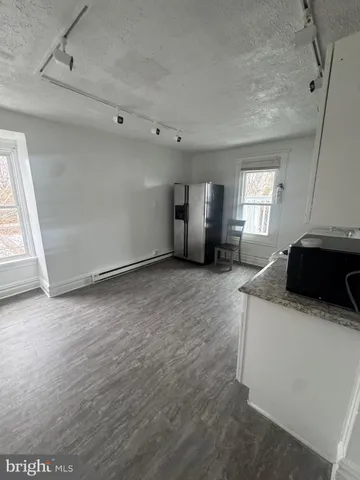 an empty room with windows