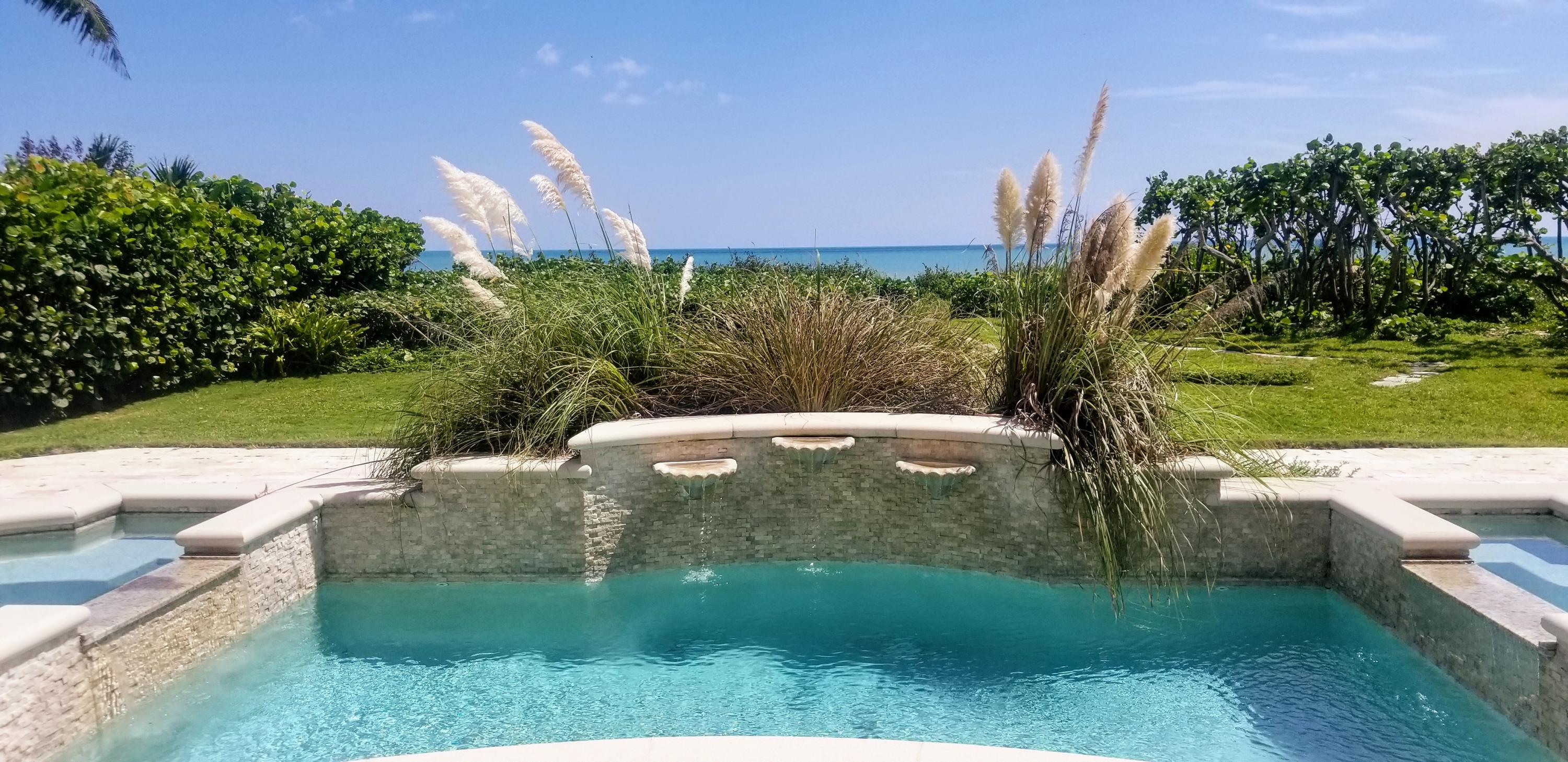19 North Beach Road Hobe Sound, FL 33455 - Photo 15 of 75 Pool and view from kitchen