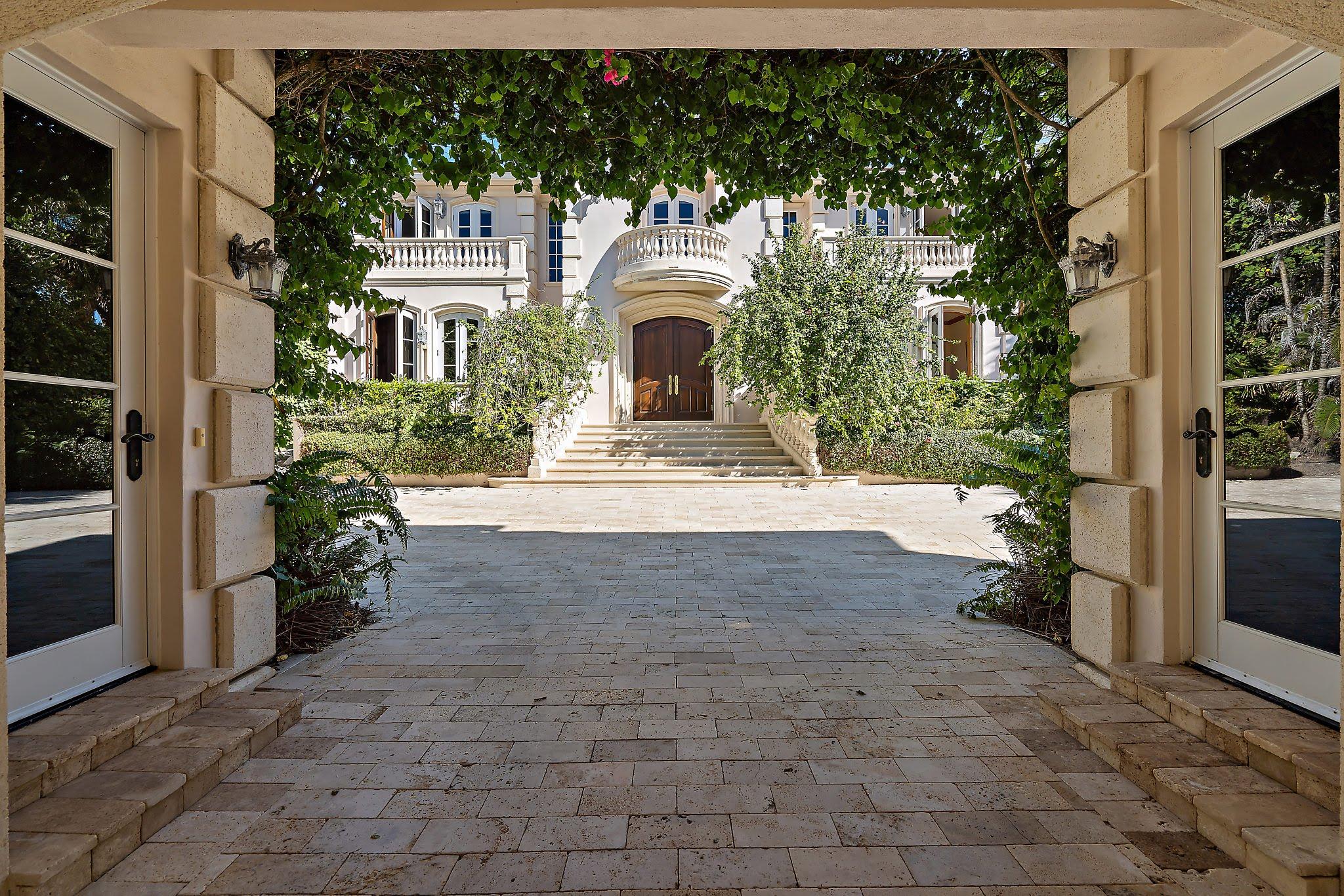 19 North Beach Road Hobe Sound, FL 33455 - Photo 7 of 75 Under Porte-cochere looking at Main home