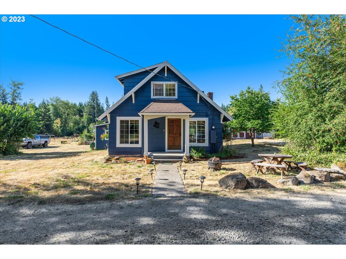 30871 South Oswalt Road Colton, OR 97017 - Photo 9 of 35 a front view of a house with garden