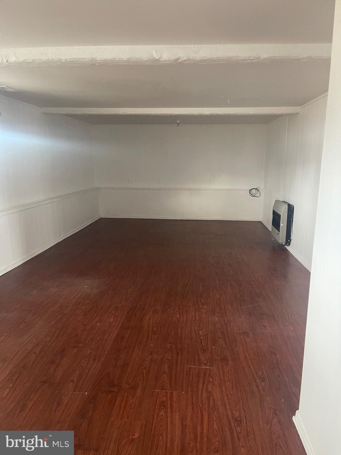 183 Lincoln Road Wenonah, NJ 08090 - Photo 14 of 19 a view of a big room with wooden floor