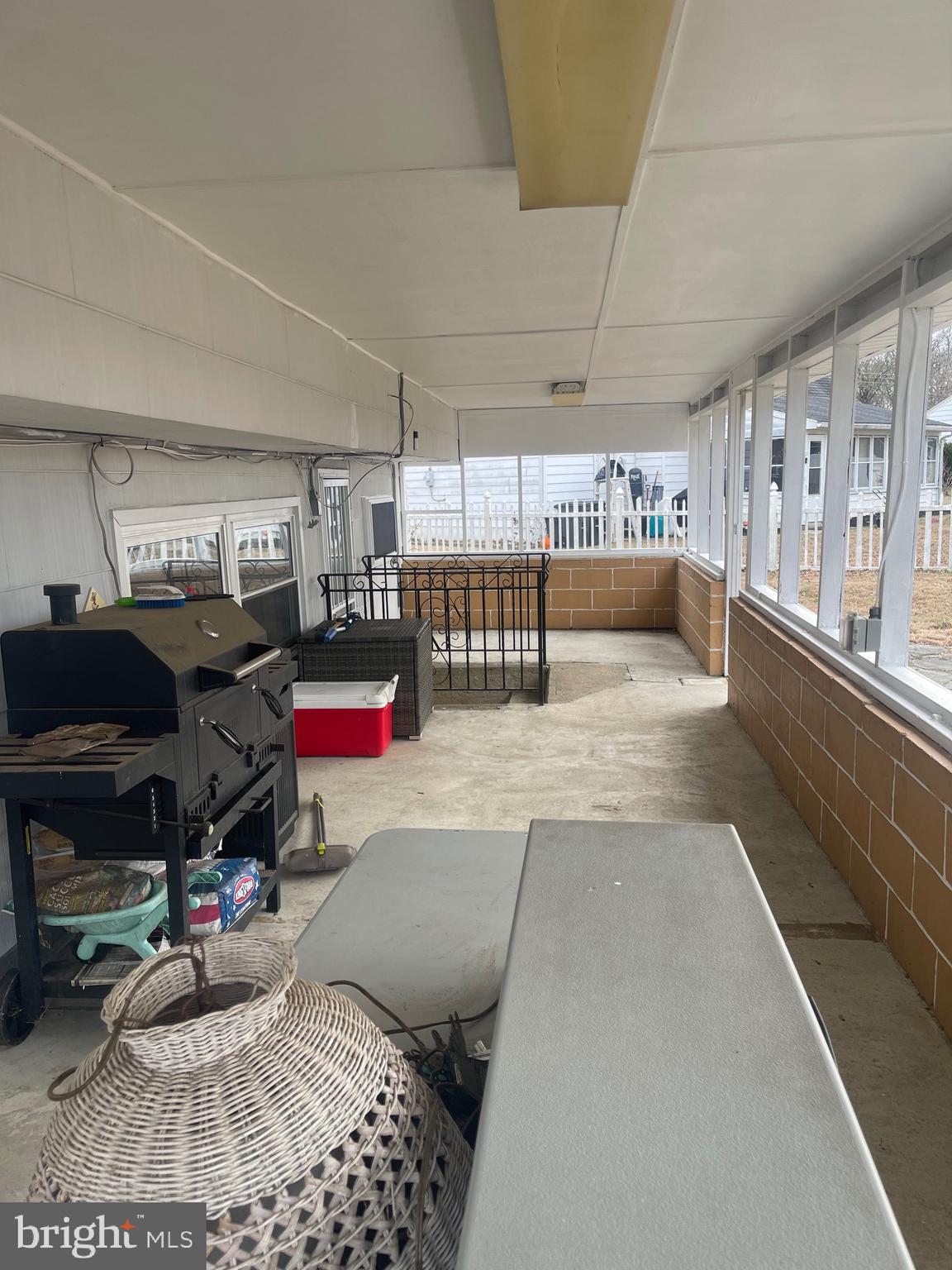 183 Lincoln Road Wenonah, NJ 08090 - Photo 18 of 19 a living room with lots of furniture and clutter