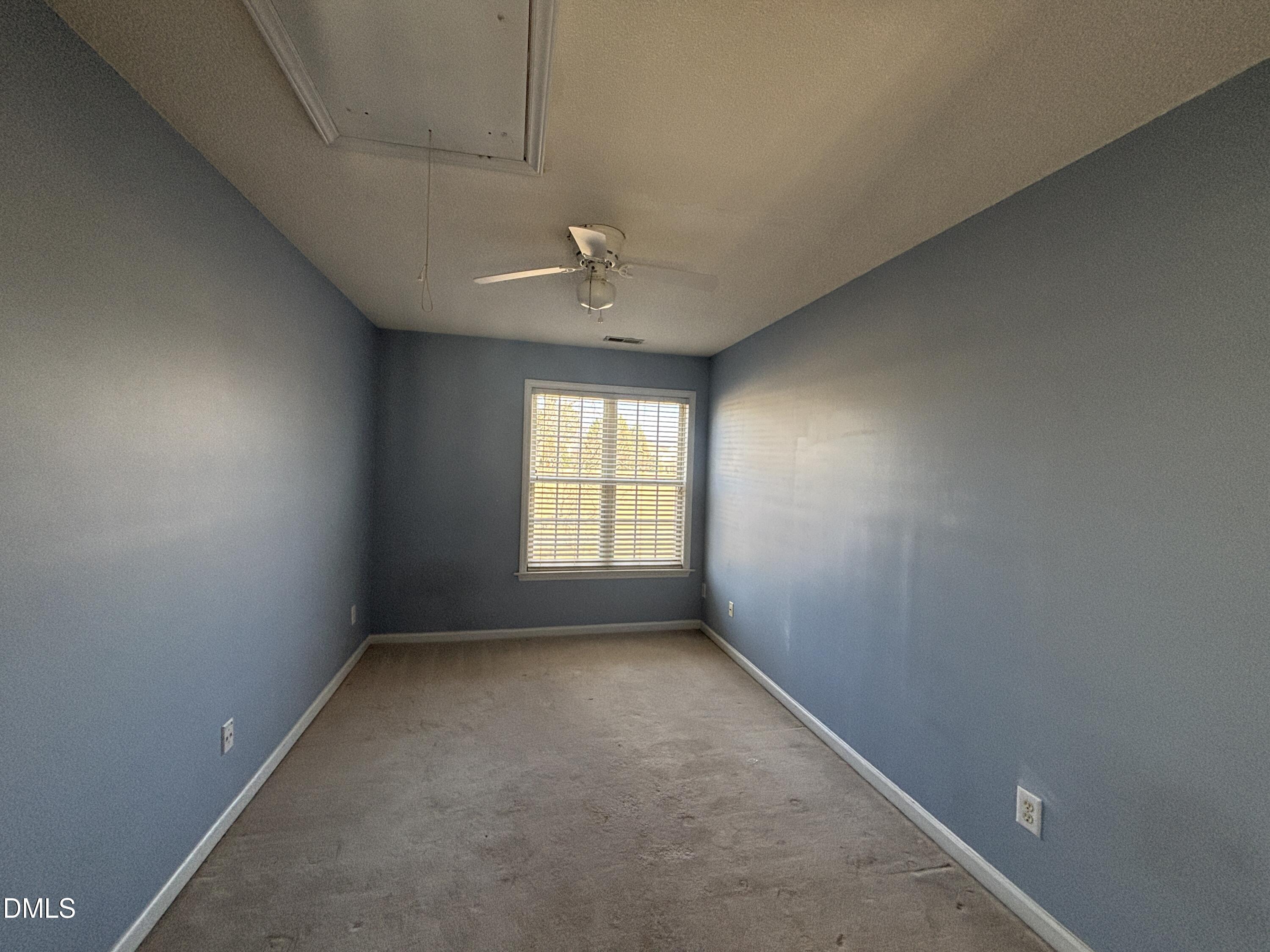 1704 Crag Burn Lane Raleigh, NC 27604 - Photo 16 of 22 an empty room with a window