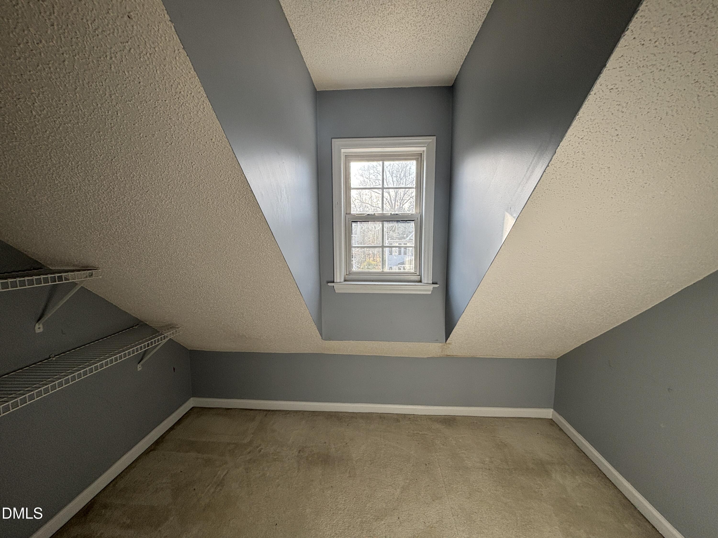 1704 Crag Burn Lane Raleigh, NC 27604 - Photo 19 of 22 an empty room with windows