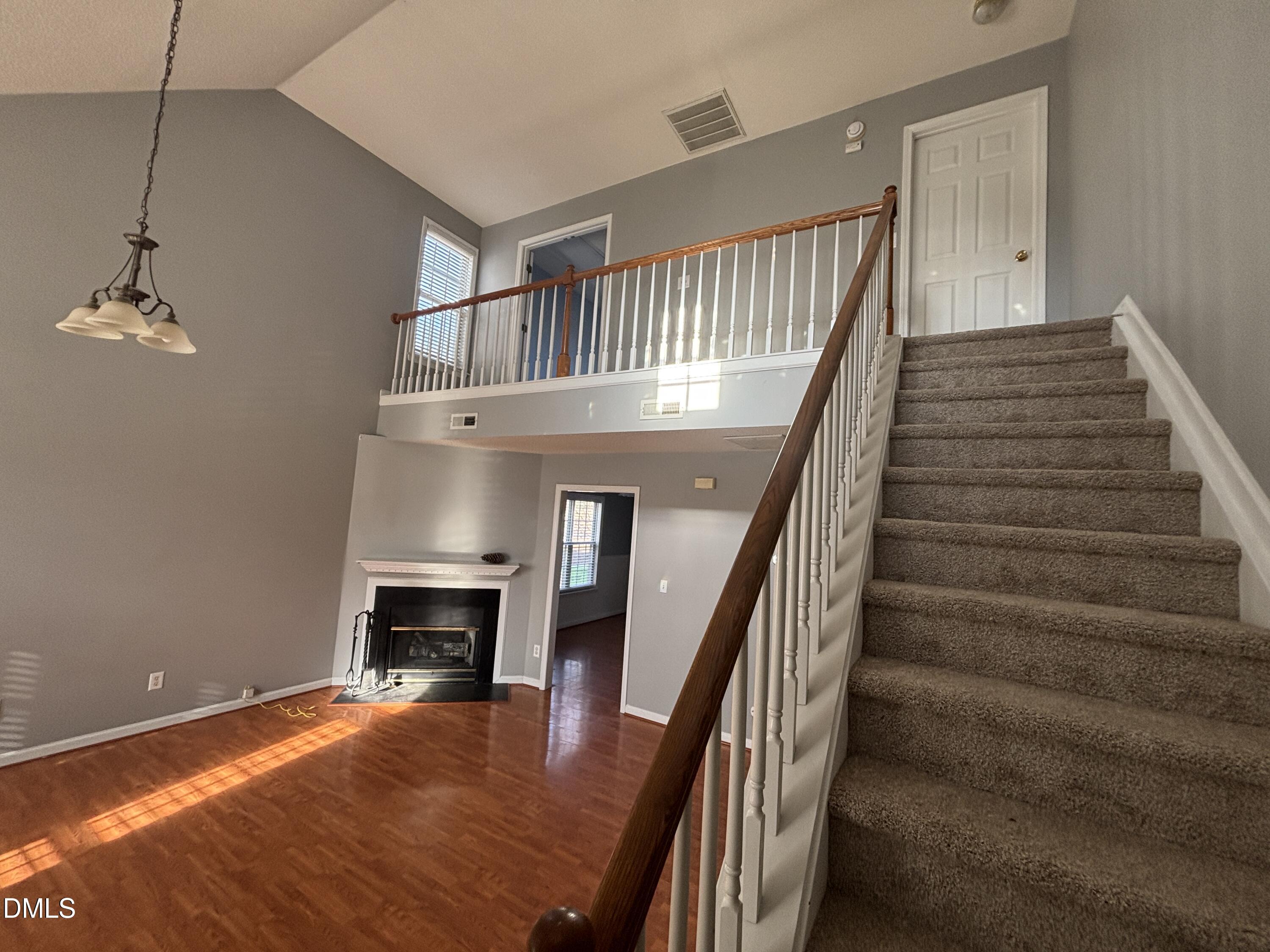 1704 Crag Burn Lane Raleigh, NC 27604 - Photo 4 of 22 a view of entryway and hall with wooden floor