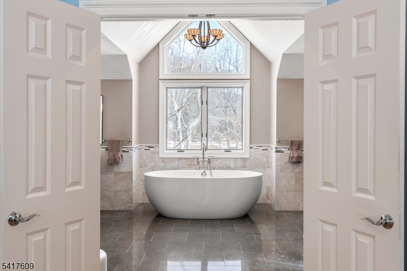 2 Cobblefield Road Mendham, NJ 07945 - Photo 26 of 50 a spacious bathroom with a bathtub and window