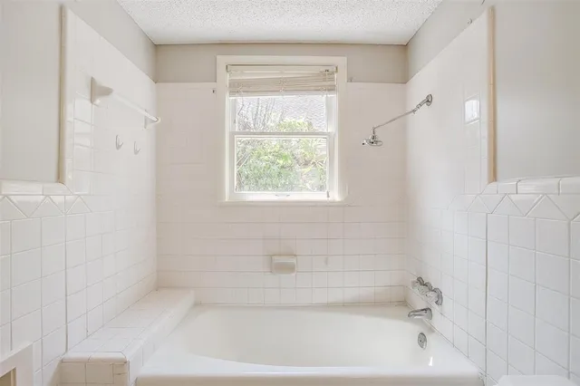 a bathroom with a bathtub
