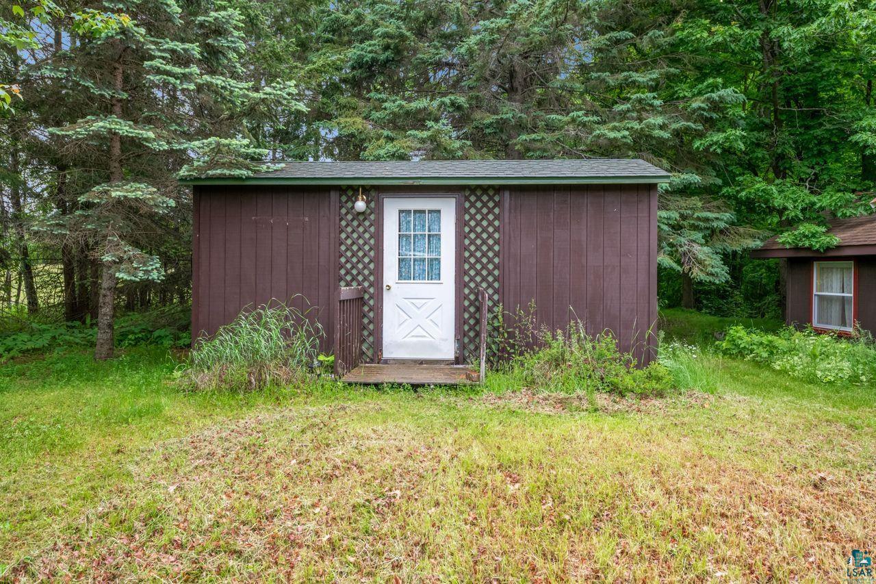 55675 Ashland Bayfield Road Mason, WI 54856 - Photo 15 of 26 View of shed / structure with a lawn