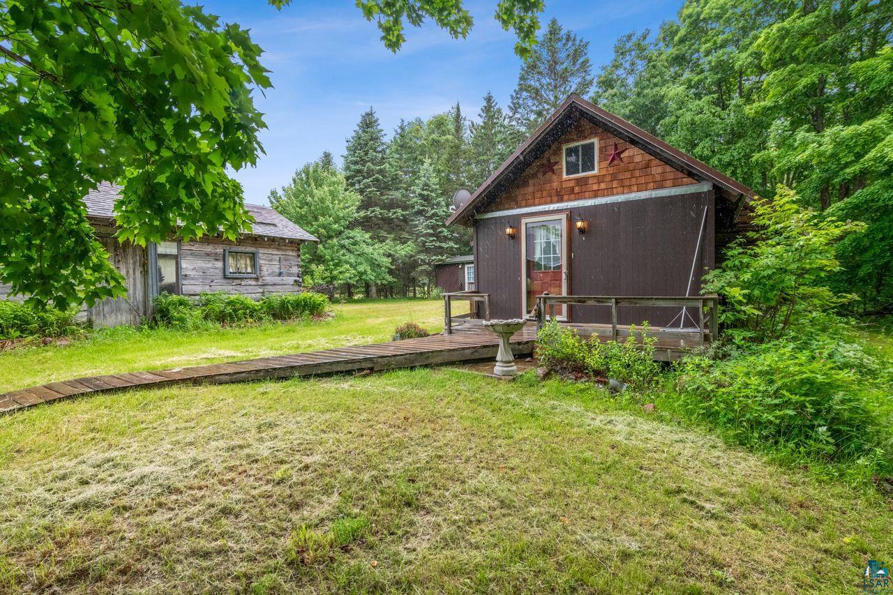 55675 Ashland Bayfield Road Mason, WI 54856 - Photo 22 of 26 Exterior space with a wooden deck and a lawn