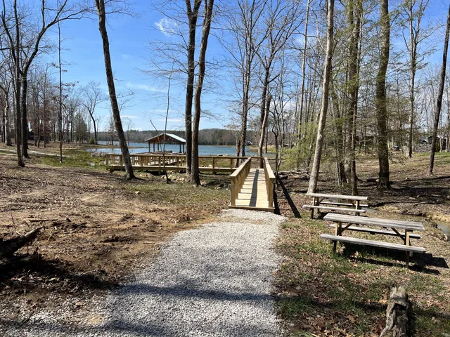 a view of outdoor space with seating area and trees