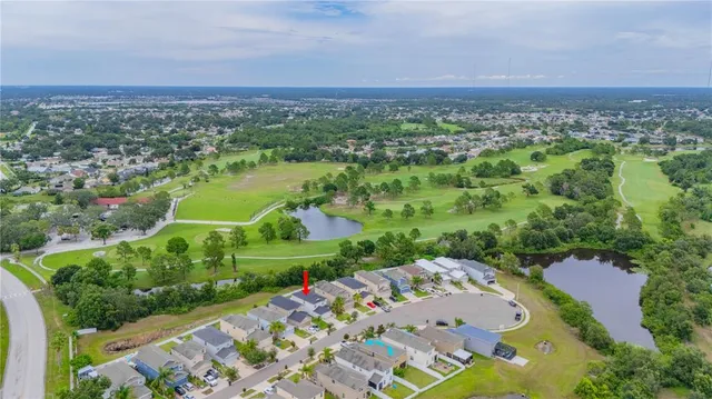 a view of a city with a lake