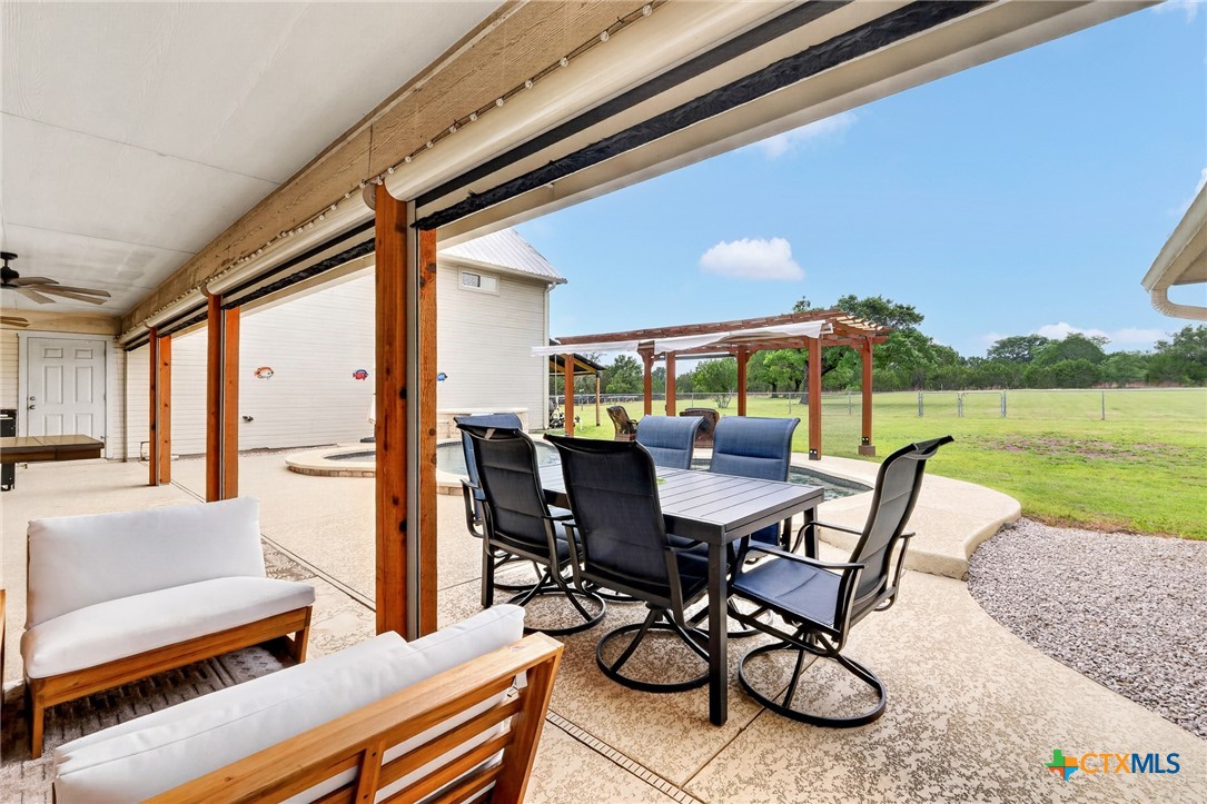 421 Sunset Ridge Drive Killeen, TX 76549 - Photo 45 of 47 a view of a patio with chairs and table in the patio
