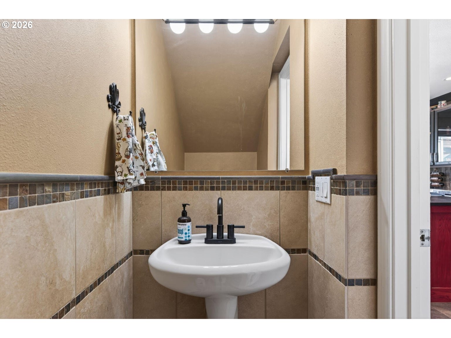 538 North Tam Rim Drive Sisters, OR 97759 - Photo 17 of 45 a bathroom with a sink a toilet and a mirror