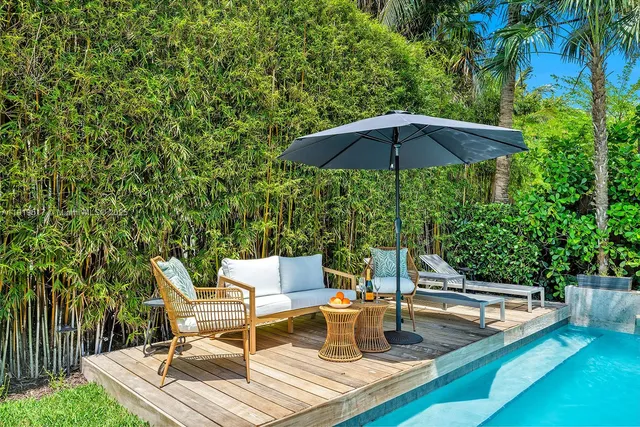 a outdoor space with patio the couches and a potted plant